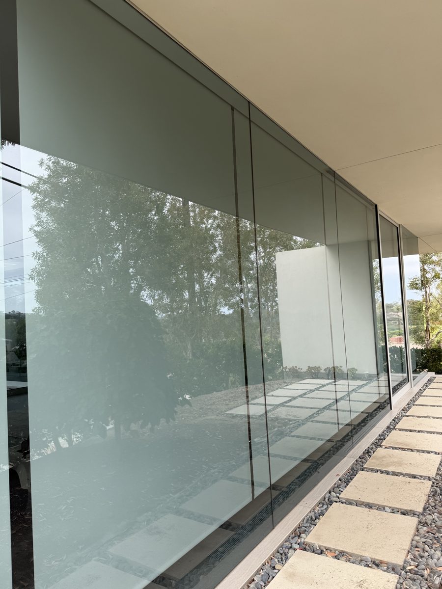 Crystal-clear floor-to-ceiling glass after cleaning
