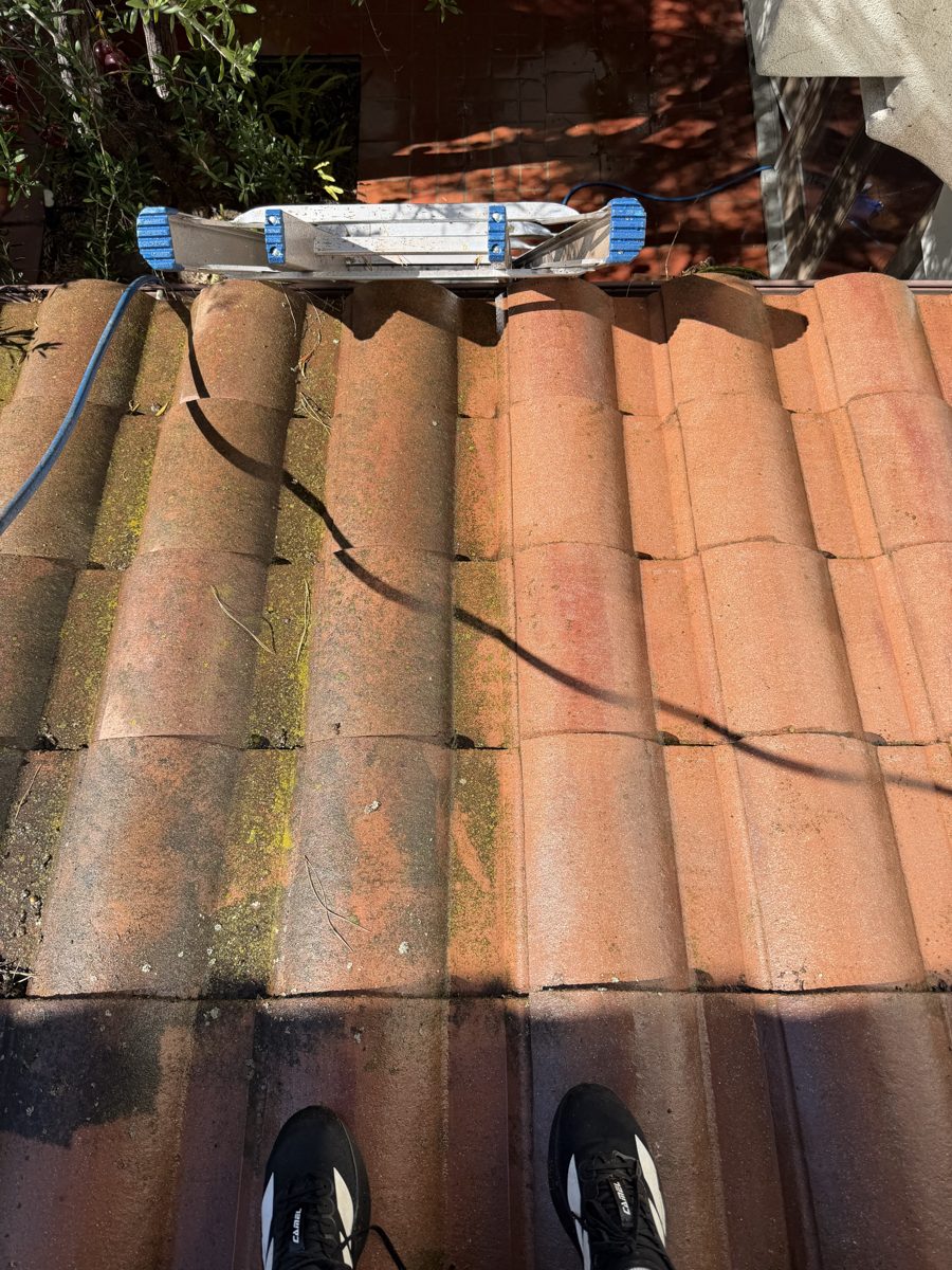Tile roof surface cleaning close up